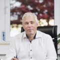 Porträt von Bruno Radermacher, Verwalter der JUMO AUTOMATION GmbH, in einem modernen Büro.